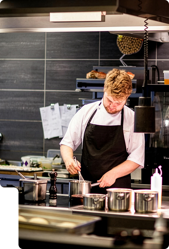 MCT Commercial Kitchens Banner With Chef Cooking