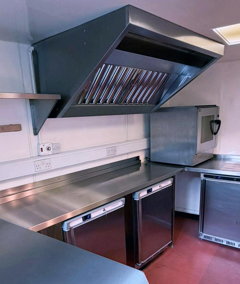 small stainless kitchen canopy